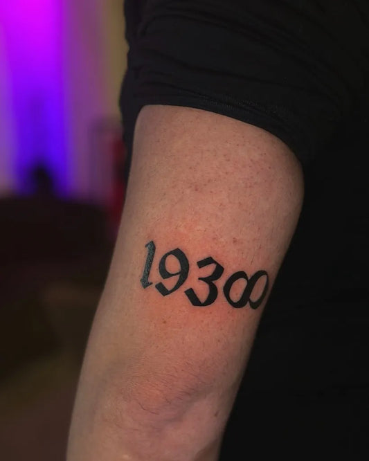 Small Blackletter 1930 on Men Arm Tattoo by @maneet__kaurr