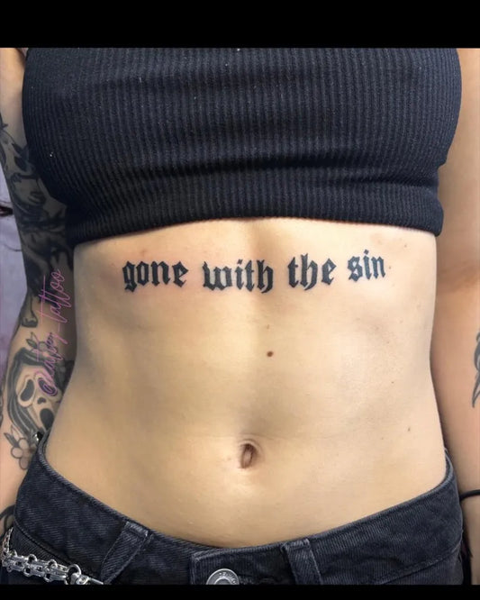Small Blackletter Text on Women Sternum Tattoo by @katiej_tattoo