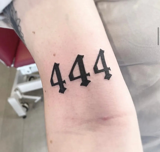 Small Blackwork 444 on Women Arm Tattoo by @mavericks_tattooparlour