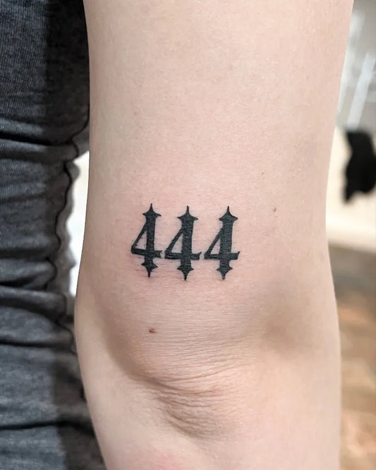 Small Blackwork 444 on Women Arm Tattoo by @therealmelforttattooshop