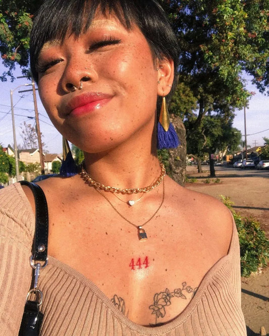 Small Blackwork 444 on Women Chest Tattoo by @missfauncy