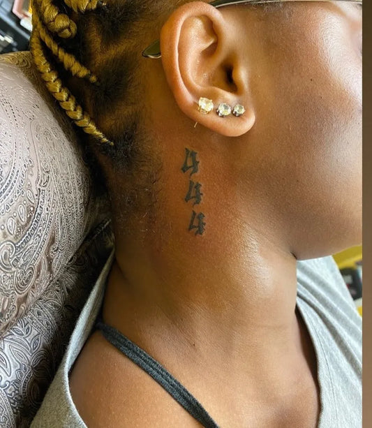 Small Blackwork 444 on Women Neck Tattoo by @trishfailla