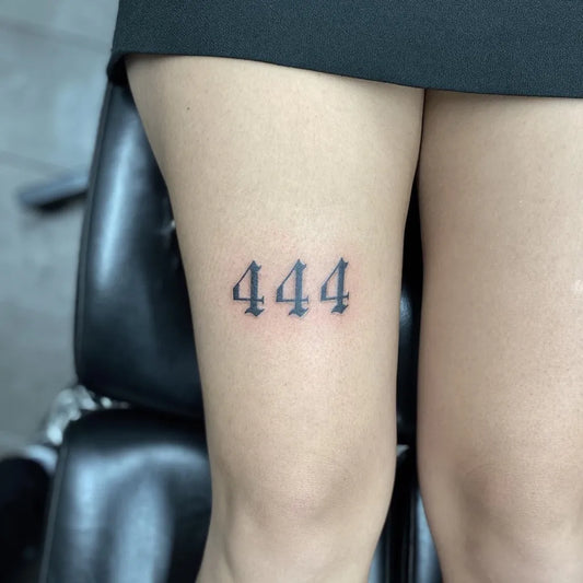 Small Blackwork 444 on Women Thigh Tattoo by @stef2026