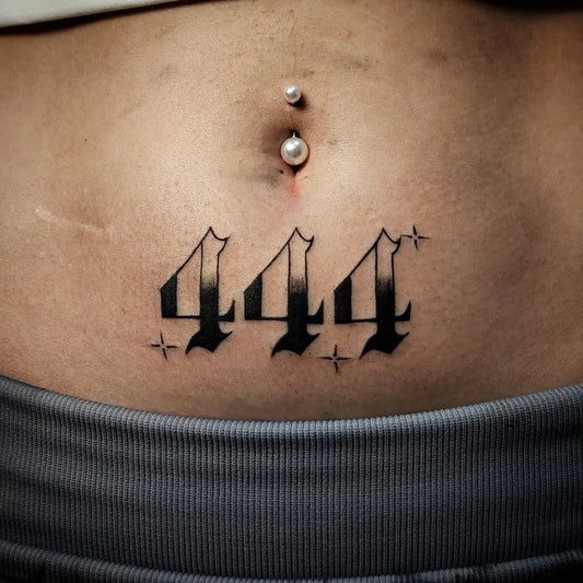 Small Blackwork 444 with stars on Women Abdomen Tattoo by @sociatattoos