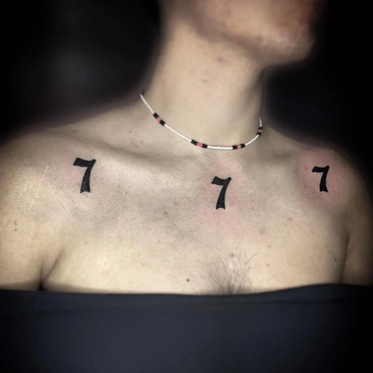 Small Blackwork 777 Tattoo on Men Chest Shoulder by @yeidy_tattoo