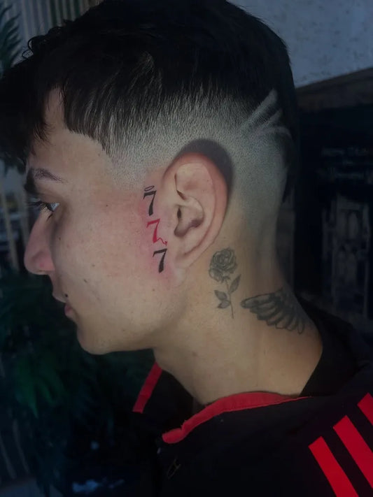 Small Blackwork 777Tattoo on Men Face by @akazatattoo