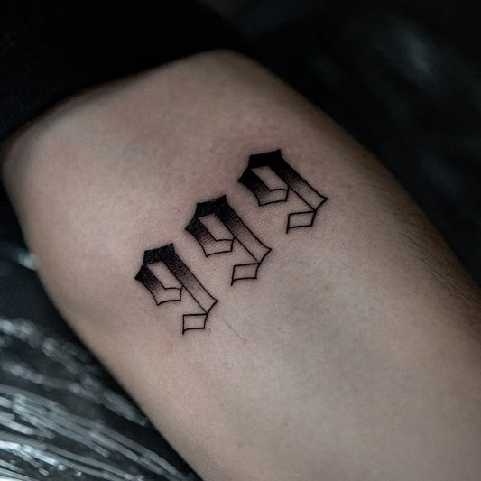 Small Blackwork 999 Number Tattoo on Men Arm by @thelifeof