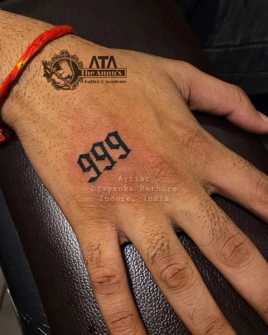 Small Blackwork 999 Tattoo on Men Hand by @annus_tattoo_indore