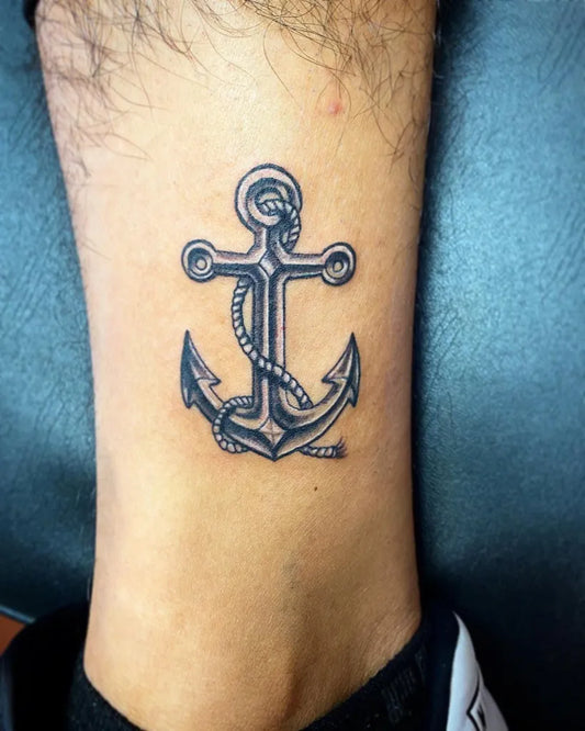 Small Blackwork Anchor Tattoo on Men Ankle by @original_jciii
