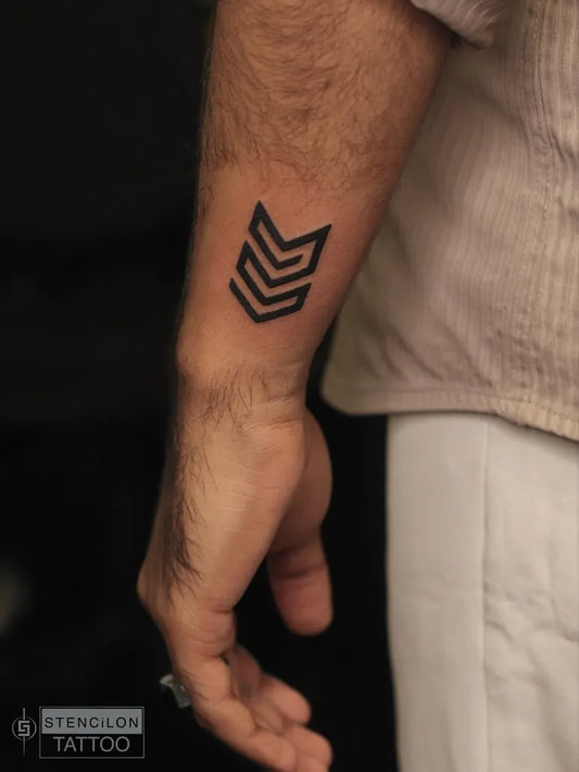 Small Blackwork Arrow Tattoo on Men Arm by @stencilontattoo