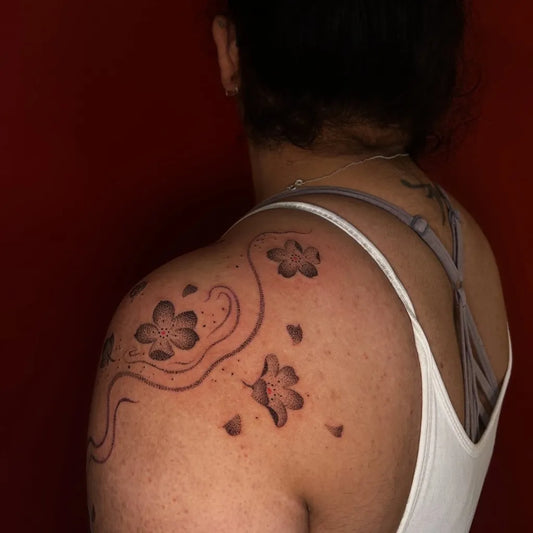 Small Blackwork Cherry Blossom Branch on Women Shoulder Flower Tattoo by @stickitytats