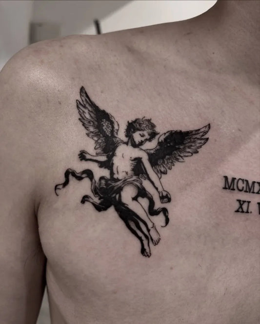 Small Blackwork Cherub Tattoo on Men Chest by @vamos_tat