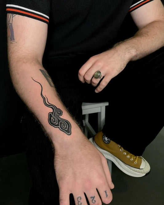 Small Blackwork Cloud Tattoo on Men Forearm by @chikage8