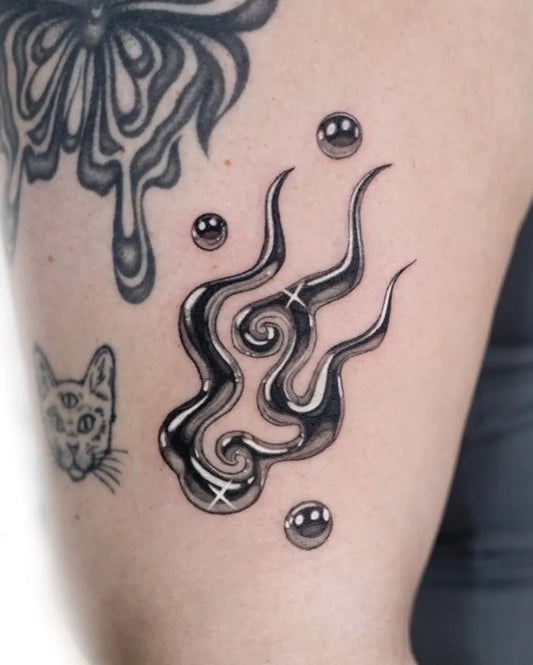Small Blackwork Cloud Tattoo on Women Arm by @zero_ink_