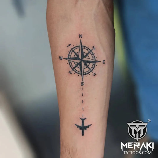 Small Blackwork Compass Airplane on Men Arm Tattoo by @merakitattooindia