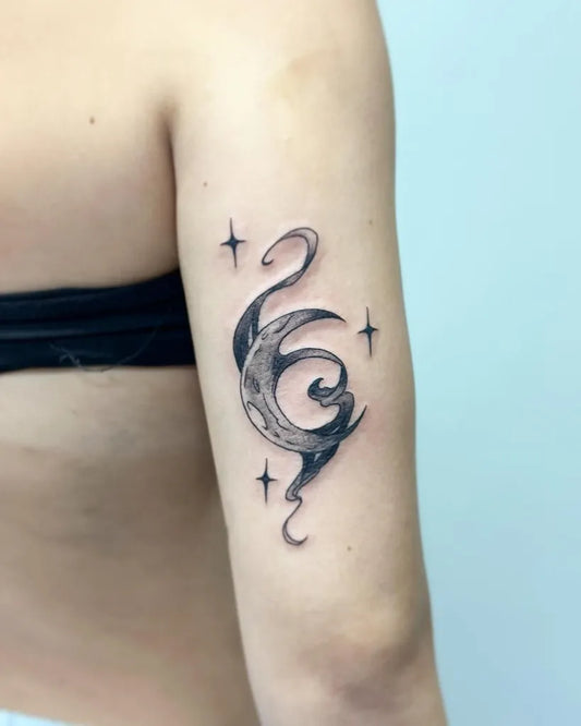 Small Blackwork Crescent Moon and Stars Tattoo on Women Arm by @maneki.tatz