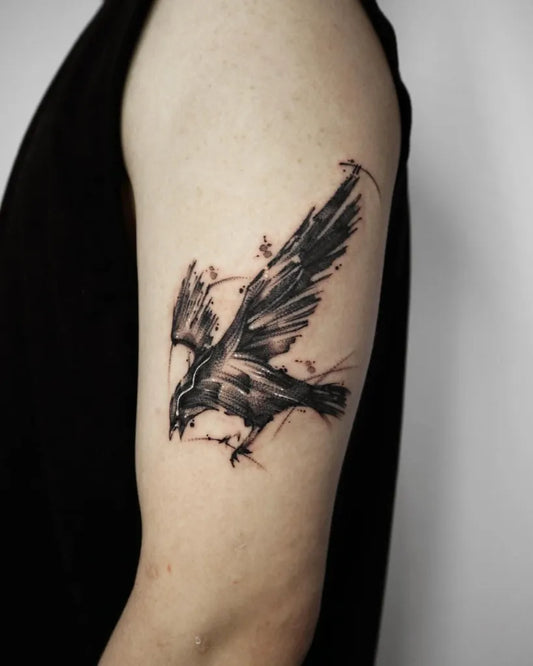 Small Blackwork Crow Tattoo on Women Arm by @ru2_tattoo