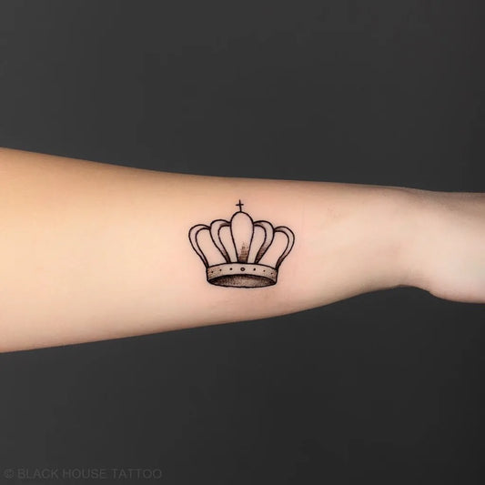 Small Blackwork Crown Tattoo on Women Forearm by @blackhousetattoo