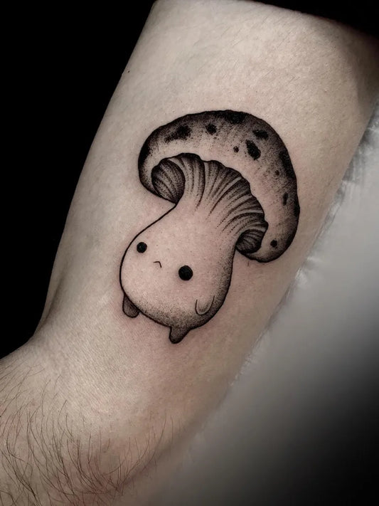 Small Blackwork Cute Mushroom on Men Arm Tattoo by @juny_todd