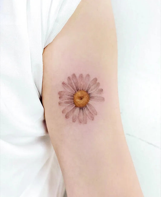 Small Blackwork Daisy Tattoo on Women Arm by @eontattoo