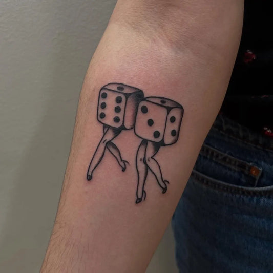 Small Blackwork Dancing Dice Tattoo on Women Forearm by @ghoulblin