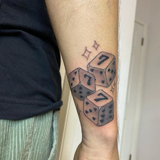 Small Blackwork Dice Tattoo on Men Forearm by @jesus_martinez_b