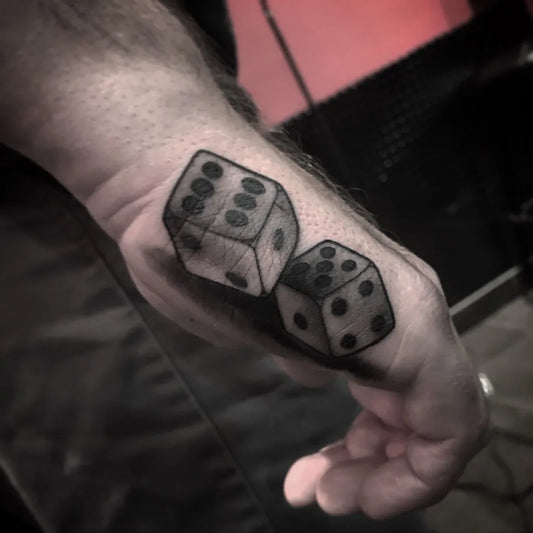 Small Blackwork Dice Tattoo on Men Wrist by @shane_campos1
