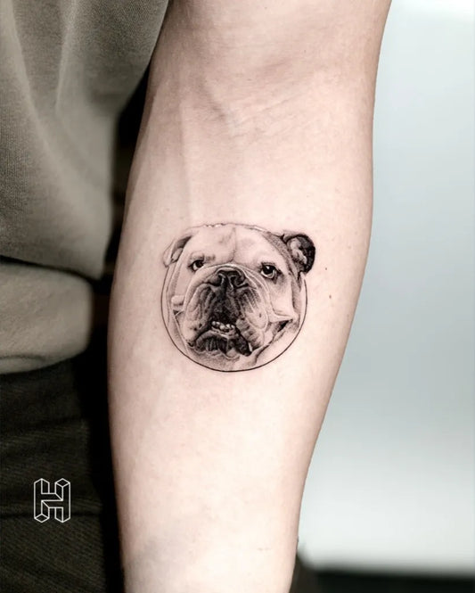 Small Blackwork Dog Tattoo on Women Arm by @hanzloch.tattoo