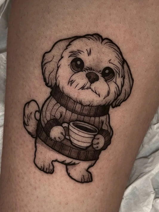 Small Blackwork Dog with Coffee Tattoo on Women Thigh by @gabigomes.ink