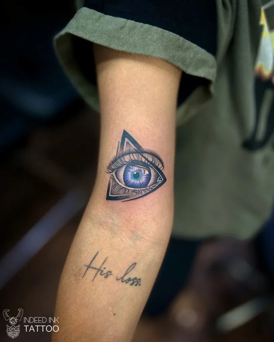 Small Blackwork Eye on Women Arm Tattoo by @indeedinktattoo