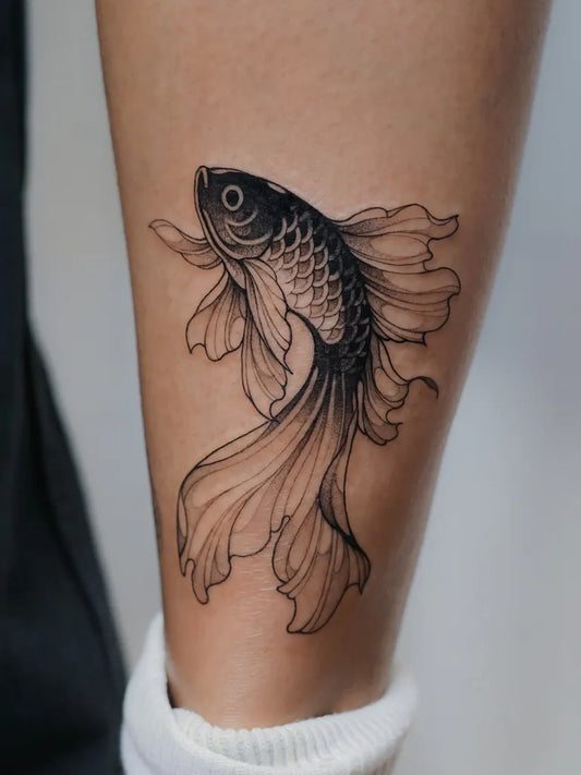 Small Blackwork Fish Tattoo on Women Leg by @mishbae