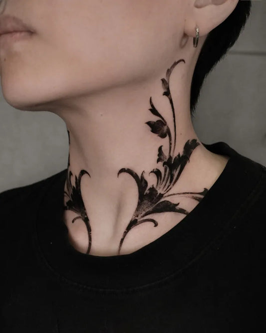 Small Blackwork Floral Vines on Women Neck Tattoo by @chenjie.newtattoo