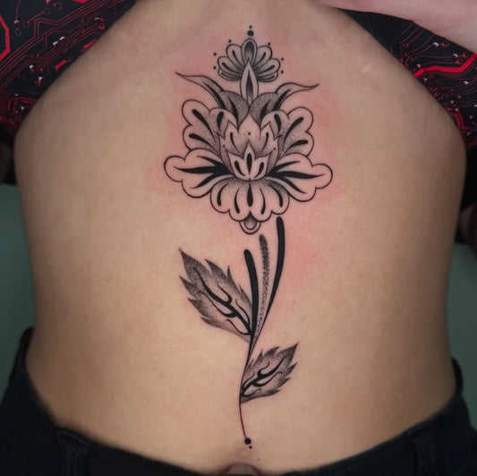 Small Blackwork FloralTattoo on Women Stomach by @inkedbycri