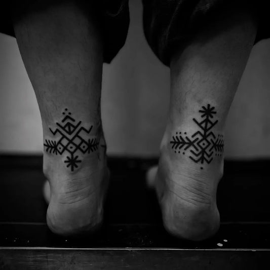 Small Blackwork Geometric Symbols Tattoo on Men Ankle by @hands.inked