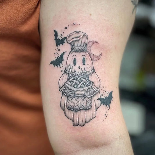 Small Blackwork Ghost Chef Bats Tattoo on Women Arm by @firehousetattoo