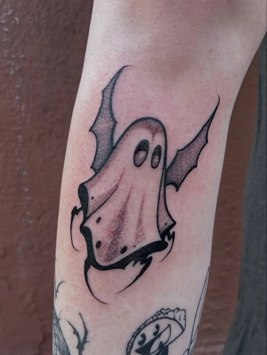 Small Blackwork Ghost Tattoo on Women Forearm by @crookaloop