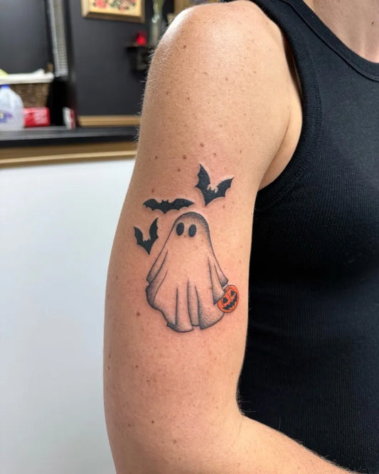 Small Blackwork Ghost and Bats Tattoo on Women Arm by @casketlovers