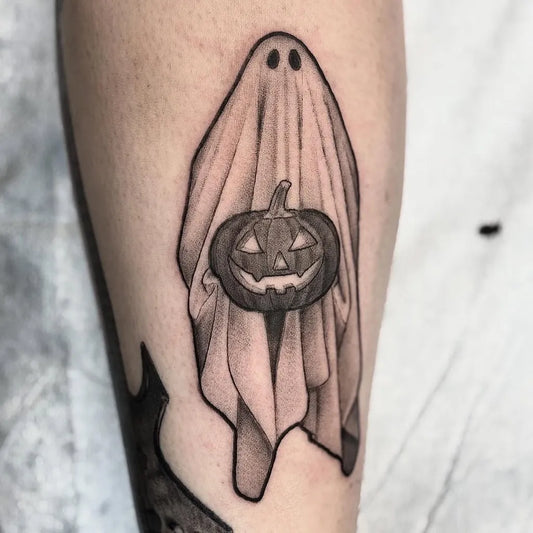 Small Blackwork Ghost with Pumpkin Halloween Tattoo on Women Forearm by @nicholas_tattoos