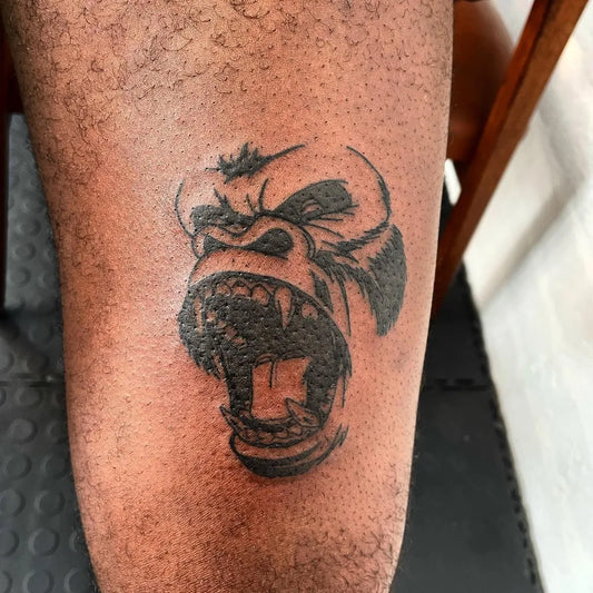 Small Blackwork Gorilla Tattoo on Men Leg by @pienktattoos