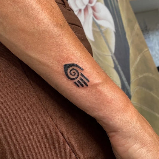 Small Blackwork Hamsa Hand Spiritual Tattoo on Women Forearm by @elmedi.ink
