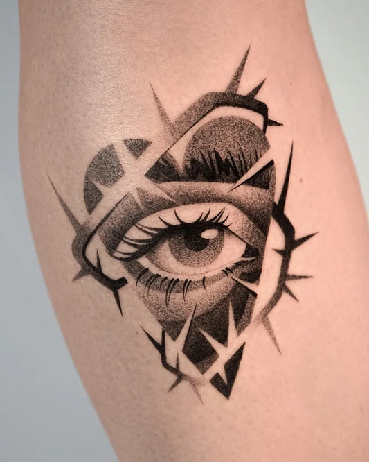 Small Blackwork Heart Eye Barbed Wire on Women Arm Tattoo by @duzo.kropek.malo.kresek