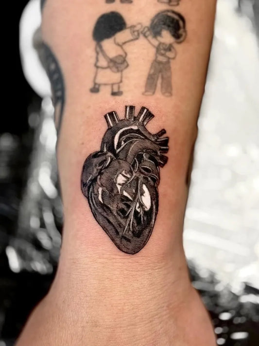 Small Blackwork Heart and Children on Women Forearm Tattoo by @tuccitatt