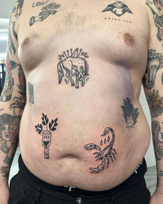 Small Blackwork Horse Scorpion Bottle Tattoo on Men Stomach by @jvckbarrow