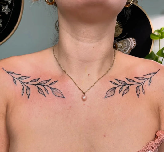Small Blackwork Leaves Tattoo on Women Collarbone by @aclay.tattoos