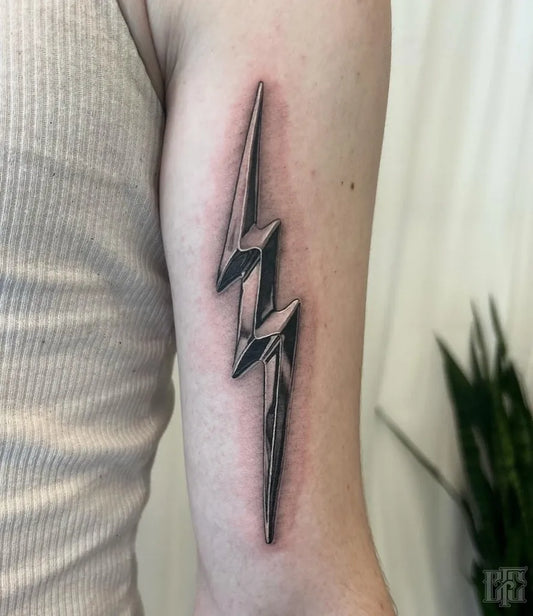Small Blackwork Lightning Bolt Tattoo on Men Arm by @caysonfc_tattoos