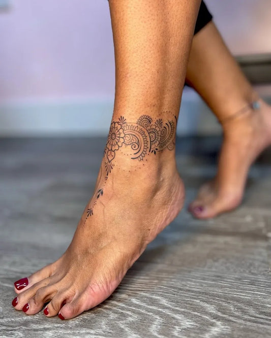 Small Blackwork Mandala Tattoo on Women Ankle by @nikkitattoox