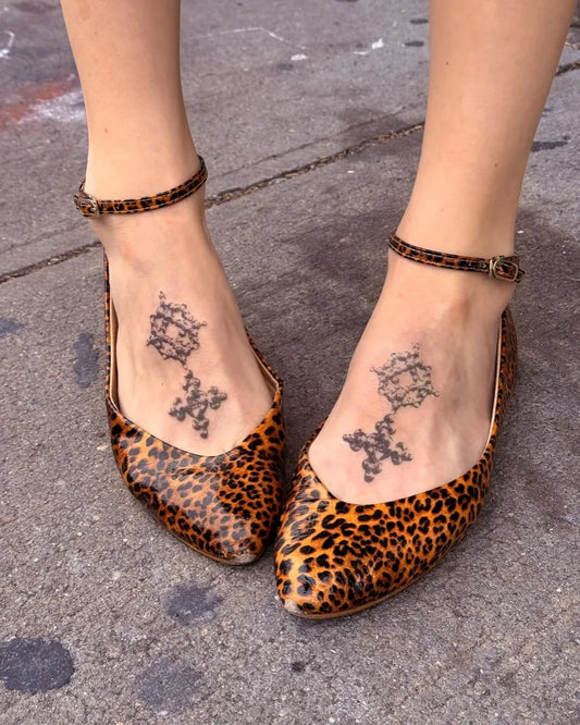 Small Blackwork Mandala and Cross Tattoo on Women Foot by @savage.sticks