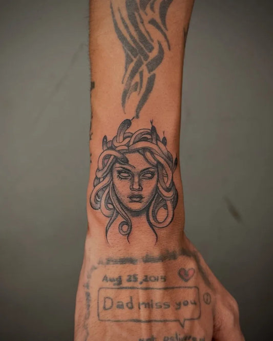 Small Blackwork Medusa and Memorial on Men Wrist Tattoo by @getinkedjdp