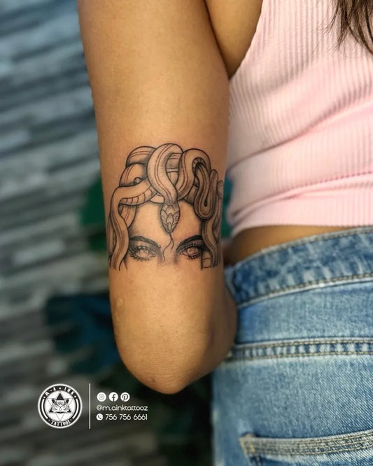 Small Blackwork Medusa with Snakes on Women Arm Tattoo by @k_patil1011