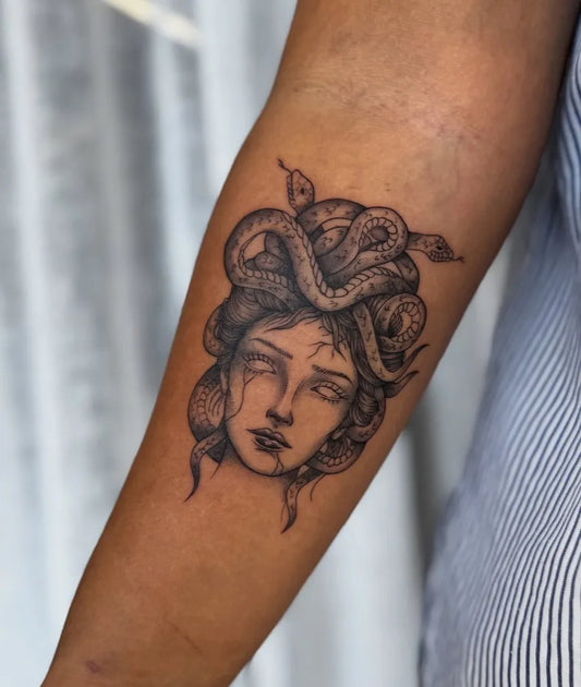 Small Blackwork Medusa with Snakes on Women Arm Tattoo by @lara.ink_